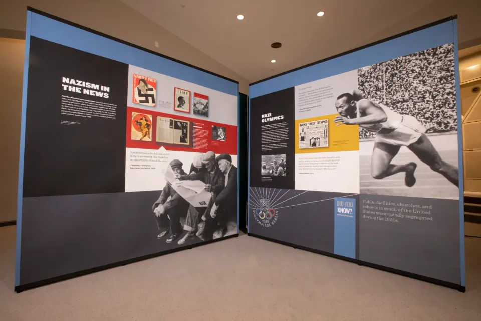Display panels with black and white photos and text.